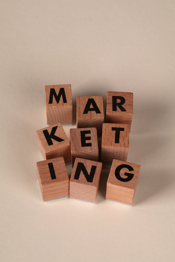 Mastering the First Impression: Your intriguing post title goes here Wooden blocks arranged to spell 'MARKETING' on a neutral background.